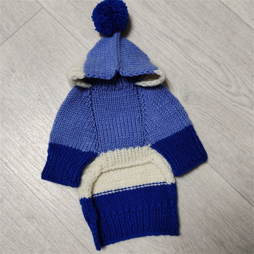 Blue knitted sweater with a hood for small dogs made of wool yarn