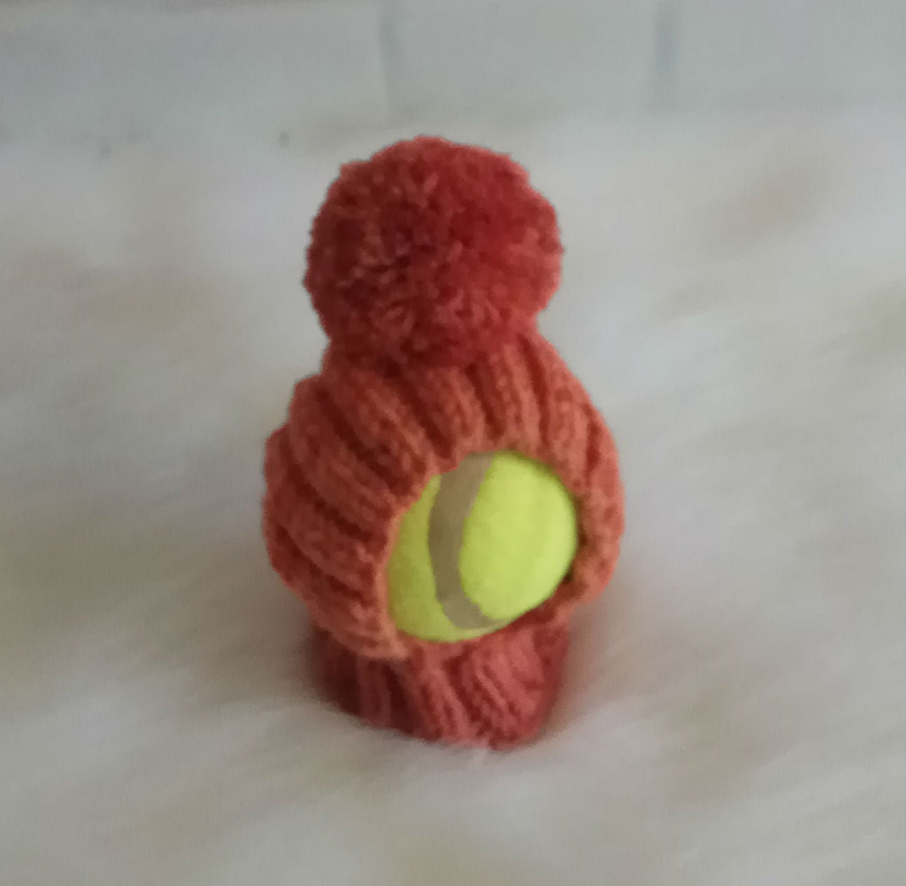 Handmade knitted dog hat with pompom, custom made to fit small dog