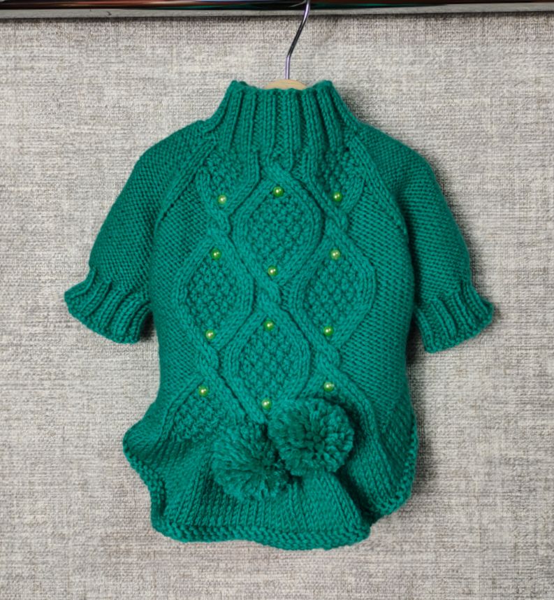 Green knitted dress dogs made of wool yarn