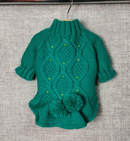 Green knitted dress dogs made of wool yarn